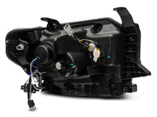 Load image into Gallery viewer, Raxiom 14-21 Toyota Tundra Axial Projector Headlights w/ SEQL LED Bar- Black Housing (Clear Lens)