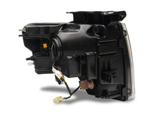 Load image into Gallery viewer, Raxiom 09-14 Ford F-150 Axial Series Headlights w/ LED Bar- Black Housing (Clear Lens)