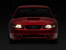 Load image into Gallery viewer, Raxiom 99-04 Ford Mustang Axial Series OEM Style Replacement Headlights- Black Housing (Smoked Lens)