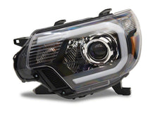 Load image into Gallery viewer, Raxiom 12-15 Toyota Tacoma Axial Projector Headlights w/ SEQL LED Bar- Black Housing (Clear Lens)