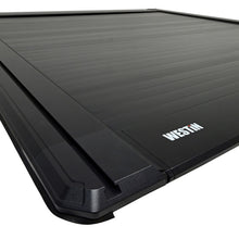 Load image into Gallery viewer, Westin 19-26 RAM 1500 New Body 5ft 7in. (67in) Bed Electric Retractable Tonneau Cover - Black
