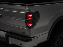 Load image into Gallery viewer, Raxiom 09-14 Ford F-150 Styleside LED Tail Lights- Black Housing (Clear Lens)