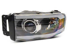 Load image into Gallery viewer, Raxiom 02-05 Dodge RAM 1500 LED Projector Headlights w/ SEQL LED Bar- Black Housing (Clear Lens)