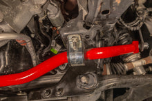 Load image into Gallery viewer, UMI Performance 21-24 Ford F-150 1 3/8in Solid Front Sway Bar - Red