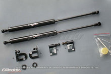 Load image into Gallery viewer, GReddy 08-11 Mitsubishi Evo X CZ4A Engine Hood Lifter Kit (Designed for OEM weight hoods.)