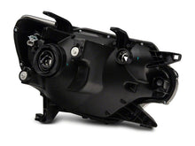 Load image into Gallery viewer, Raxiom 12-15 Toyota Tacoma Axial Series Headlights w/ LED Bar- Black Housing (Clear Lens)