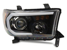Load image into Gallery viewer, Raxiom 07-13 Toyota Tundra Axial Projector Headlights w/ SEQL LED Bar- Black Housing (Clear Lens)