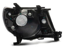 Load image into Gallery viewer, Raxiom 05-11 Toyota Tacoma Axial Series OE Replacement Headlights- Black Housing (Clear Lens)