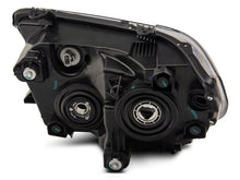 Load image into Gallery viewer, Raxiom 07-13 Toyota Tundra Axial Projector Headlights w/ SEQL LED Bar- Black Housing (Clear Lens)