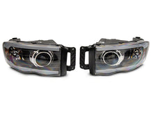 Load image into Gallery viewer, Raxiom 02-05 Dodge RAM 1500/2500/3500 Axial LED Projector Headlights- Black Housing (Clear Lens)