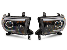 Load image into Gallery viewer, Raxiom 07-13 Toyota Tundra Axial Series Projector Headlights w/ LED Bar- Black Housing (Clear Lens)