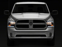 Load image into Gallery viewer, Raxiom 09-18 Dodge RAM 1500/2500/3500 Axial Headlights w/ SEQL LED Bar- Black Housing (Clear Lens)