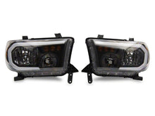 Load image into Gallery viewer, Raxiom 07-13 Toyota Tundra Axial Series Headlights w/ SEQL LED Bar- Black Housing (Clear Lens)