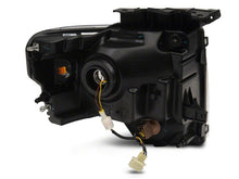 Load image into Gallery viewer, Raxiom 09-14 Ford F-150 Axial Series Headlight w/ SEQL LED Bar- Black Housing (Clear Lens)