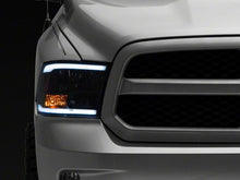 Load image into Gallery viewer, Raxiom 09-18 Dodge RAM 1500/2500/3500 Axial Headlights w/ SEQL LED Bar- Black Housing (Clear Lens)