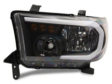 Load image into Gallery viewer, Raxiom 07-13 Toyota Tundra Axial Series Headlights w/ SEQL LED Bar- Black Housing (Clear Lens)