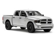 Load image into Gallery viewer, Raxiom 09-18 Dodge RAM 1500/2500/3500 Axial Headlights w/ SEQL LED Bar- Black Housing (Clear Lens)