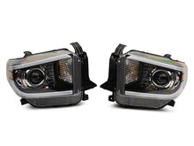 Load image into Gallery viewer, Raxiom 14-21 Toyota Tundra Axial Projector Headlights w/ SEQL LED Bar- Black Housing (Clear Lens)