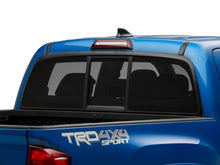 Load image into Gallery viewer, Raxiom 16-23 Toyota Tacoma Axial Series LED Third Brake Light- Clear w/ Smoked Lens
