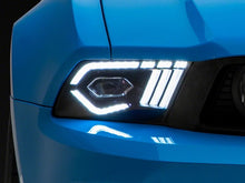 Load image into Gallery viewer, Raxiom 10-12 Ford Mustang w/ Factory Halogen LED Projector Headlights- Black Housing (Clear Lens)