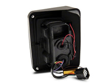 Load image into Gallery viewer, Raxiom 07-18 Jeep Wrangler JK Axial Series LED Tail Lights- Black Housing (Clear Lens)