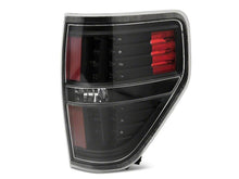 Load image into Gallery viewer, Raxiom 09-14 Ford F-150 Styleside LED Tail Lights- Black Housing (Clear Lens)