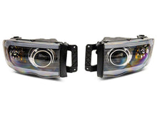 Load image into Gallery viewer, Raxiom 02-05 Dodge RAM 1500 LED Projector Headlights w/ SEQL LED Bar- Black Housing (Clear Lens)