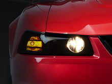 Load image into Gallery viewer, Raxiom 99-04 Ford Mustang Axial Series Projector Headlights- Black Housing (Smoked Lens)