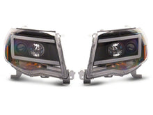 Load image into Gallery viewer, Raxiom 05-11 Toyota Tacoma Axial Series LED DRL Projector Headlights- Black Housing (Clear Lens)
