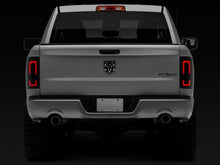 Load image into Gallery viewer, Raxiom 09-18 Dodge RAM 1500/2500/3500 Axial Series LED Tail Lights- Black Housing (Smoked Lens)
