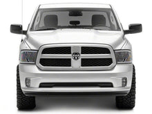 Load image into Gallery viewer, Raxiom 09-18 Dodge RAM 1500/2500/3500 Axial Headlights w/ SEQL LED Bar- Black Housing (Clear Lens)