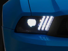 Load image into Gallery viewer, Raxiom 10-12 Ford Mustang LED Projector Headlights SEQL Turn Signals- Black Housing (Clear Lens)