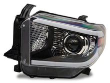 Load image into Gallery viewer, Raxiom 14-21 Toyota Tundra Axial Series Projector Headlights w/ LED Bar- Black Housing (Clear Lens)