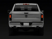 Load image into Gallery viewer, Raxiom 09-18 Dodge RAM 1500/2500/3500 Axial Series LED Tail Lights- Black Housing- Smoked Lens