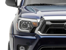 Load image into Gallery viewer, Raxiom 12-15 Toyota Tacoma Axial Projector Headlights w/ SEQL LED Bar- Black Housing (Clear Lens)