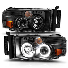 Load image into Gallery viewer, ANZO 2002-2005 Dodge Ram 1500 Projector Headlights w/ Halo Black Clear Amber - GTR Auto