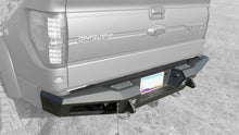 Load image into Gallery viewer, Addictive Desert Designs 10-14 Ford F-150 Raptor HoneyBadger Rear Bumper w/ Tow Hooks - GTR Auto