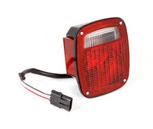 Load image into Gallery viewer, Omix Tail Light Black Housing LH 87-90 Jeep Wrangler - GTR Auto