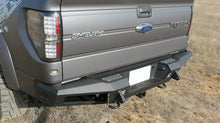 Load image into Gallery viewer, Addictive Desert Designs 10-14 Ford F-150 Raptor HoneyBadger Rear Bumper w/ Tow Hooks - GTR Auto
