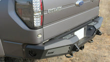 Load image into Gallery viewer, Addictive Desert Designs 10-14 Ford F-150 Raptor HoneyBadger Rear Bumper w/ Tow Hooks - GTR Auto