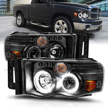 Load image into Gallery viewer, ANZO 2002-2005 Dodge Ram 1500 Projector Headlights w/ Halo Black Clear Amber - GTR Auto