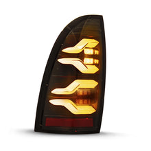 Load image into Gallery viewer, AlphaRex 05-15 Toyota Tacoma LUXX LED Taillights Blk w/Activ Light/Seq Signal - GTR Auto