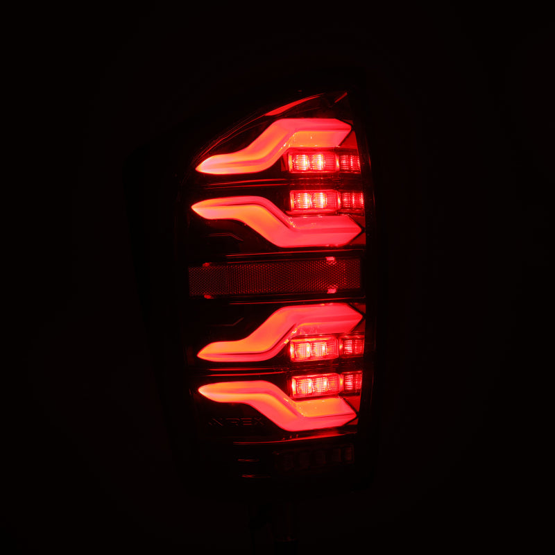 AlphaRex 16-21 Toyota Tacoma LUXX LED Taillights Alpha Blk w/Activ Light/Seq Signal - GTR Auto
