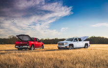 Load image into Gallery viewer, UnderCover 2019 GMC Sierra 1500 (w/o MultiPro TG) 5.8ft Elite LX Bed Cover - Deep Ocean Blue UC1198L-G1K